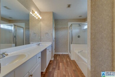 Huge master bath with double vanity, soaker tub, s