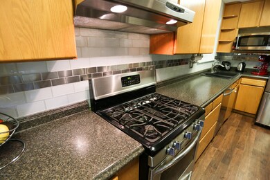 Glass and Stainless Tile backsplash