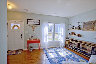 View of hardwood floored entrance foyer