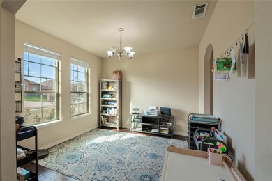 Office featuring wood-type flooring and a notable 