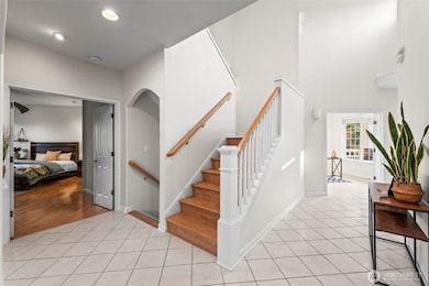 Stairways lead to 2nd floor and basement