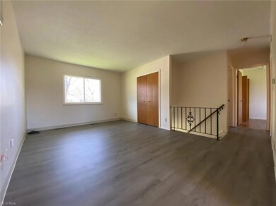 upstairs living room, connected to the kitchen