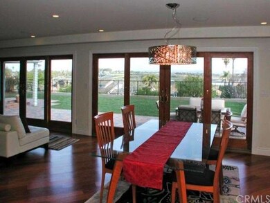 Large informal dining area with views of mountains