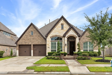 Stunning 1-story home with brick & stone elevation