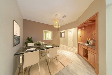 The dining room is connected with the living room.