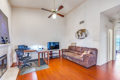 Spacious Living Room  high vaulted ceiling, and a tile fireplace