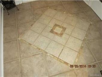 Tile flooring in the foyer.