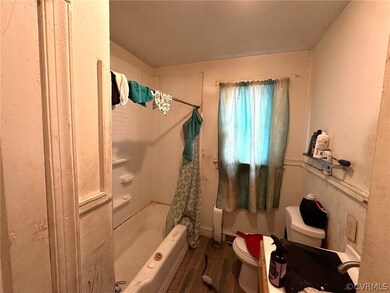 Bathroom featuring hardwood / wood-style flooring,