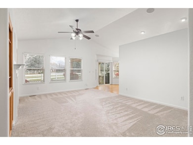 Living room with vaulted ceilings