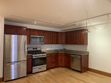 2440 Massachusetts Ave unit 5, Cambridge, MA 02140 - photo 2