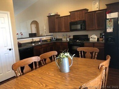 Kitchen with lots of custom cabinets, counter spac