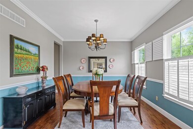 Formal dining room - lovely white shutters.