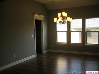 Large formal dining with natural light.