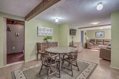 Enter into unit 1 dining room off the side entrance through the gate