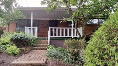Nice front porch for relaxing on a quiet day.