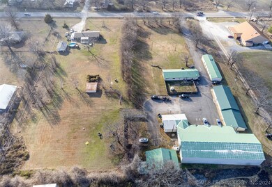 Aerial view of subject property is on the left.