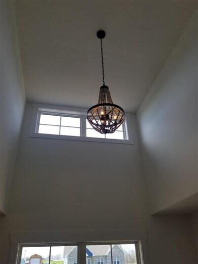 Dining room has dormer casting tons of light into 