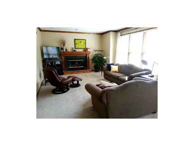 Great room with gorgeous fireplace and plenty of s