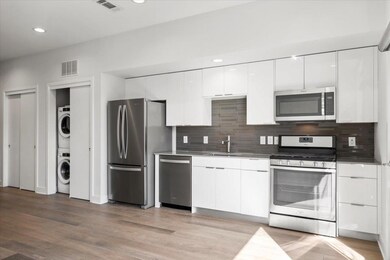 Kitchen with a sink, appliances with stainless st