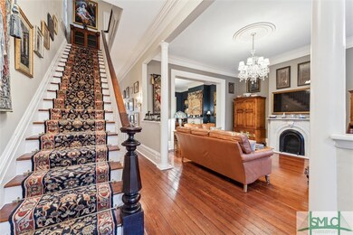 Entry to double foyer that highlights original har