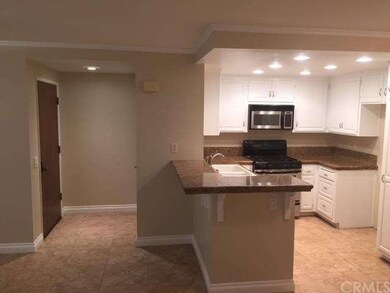 looking at the front entry area. Room for barstool