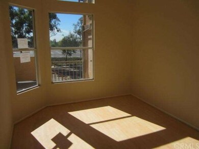 Light and bright with laminate flooring.