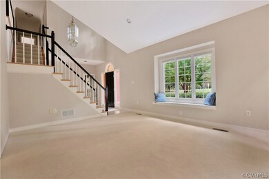 Living room with window seat (newer windows) and c