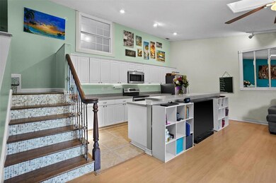 Open living, dining, and kitchen