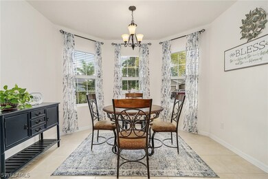 Dining area featuring a bay window providing natur