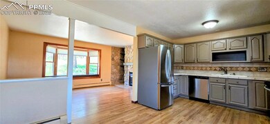 Kitchen featuring appliances with stainless steel 