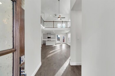Entrance foyer with hardwood / wood-style floors, 
