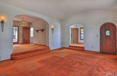 View from living room of entry door on right, brea