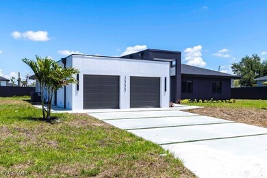 Contemporary house with an attached garage, stucco