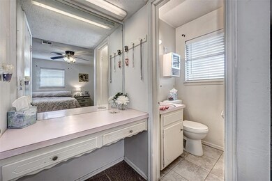 Bathroom with a healthy amount of sunlight, toilet