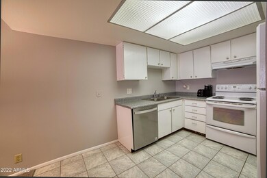 White cabinetry in Kitchen