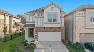 View of front facade featuring stucco siding, con