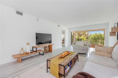 Living area with light wood-type flooring, baseboa