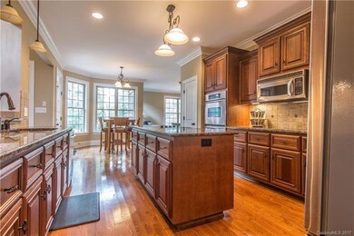 Gourmet kitchen with granite counter tops, stainle