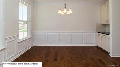 Beautiful dining room with a butler's pantry at th