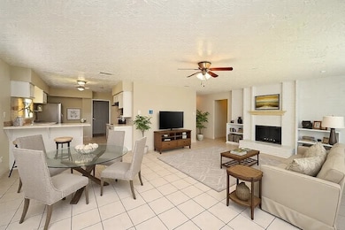 Virtually staged breakfast area and living room