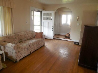 Living Room. Receive your callers with glee as you