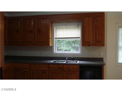 Kitchen - Custom built stained cabinets