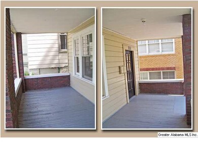 Downstairs unit has a nice front porch for lazy da