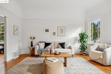 Living area featuring wood finished floors and baseboards