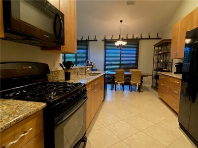 Kitchen into eat in kitchen showing plantation shu