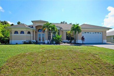 Classic Columned Entrance with Architecturally Shaped Windows Flooding Home With Light