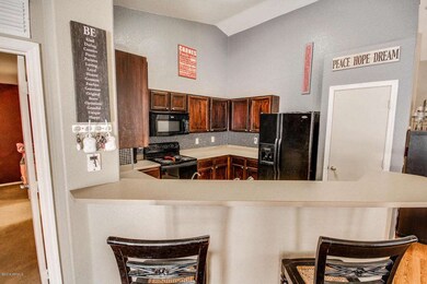Kitchen open to family and dining...