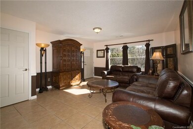 Living Room view toward front door to the right.
