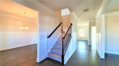 Stairs featuring ornamental molding, a notable cha