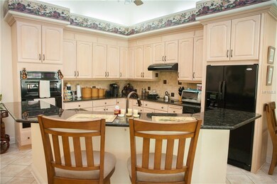 The Island Kitchen features custom upgrades such a
